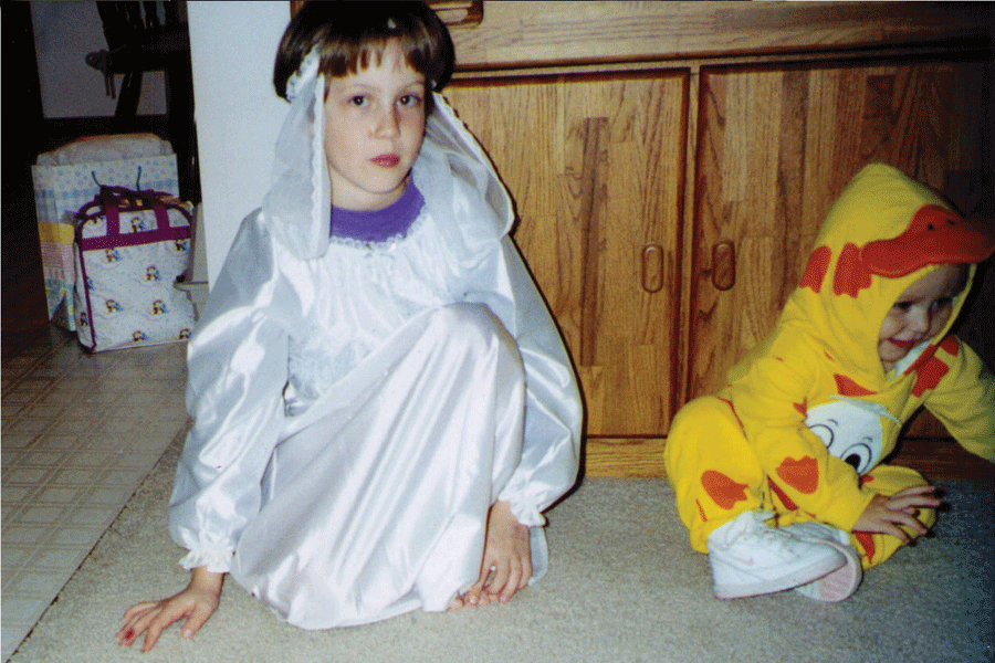 4. The Lost-To-History Mystery Costume 

You stare at the long-lost photo your parents never labeled because they always thought they’d “get to it eventually.” Were you a princess? A bride? An angel? And what about your little sister? At first glance, she seems to be a baby duck, but then you notice that there’s an extra face on her chest and little duck feet all over her body. Maybe she was meant to be a duck that got caught in a toxic waste spill? Perhaps it was your parents’ political statement against the oil spills that harm aquatic wildlife? The world may never know.
