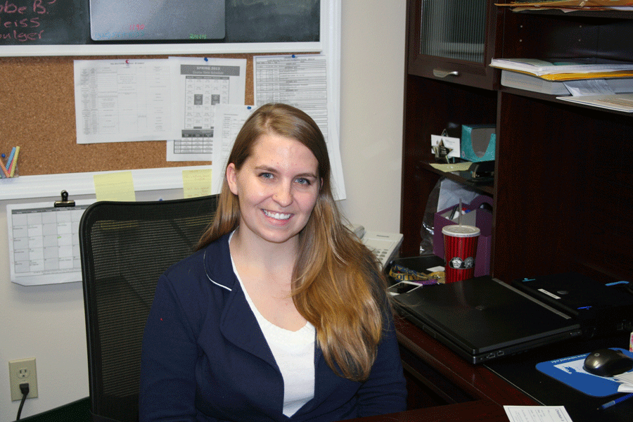Bemiller sits at her desk located in the lower level of William A. Krueger Hall. 