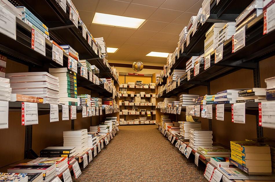 A row of books awaits students and their wallets.