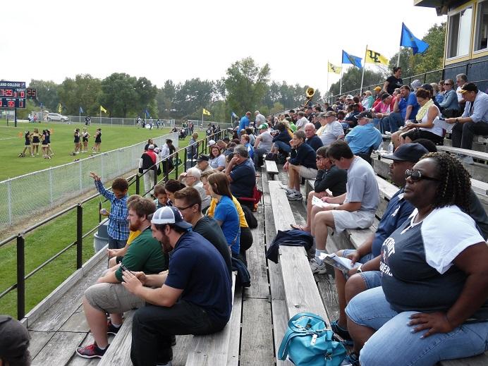The crowd looks on during the homecoming Muskie football game against Carthage College on Sept. 26, 2015.