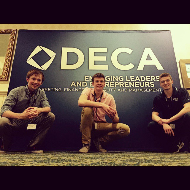 Seth, vice president and operations director for Glanzair, Alex Whitt, vice president and sales manager for Glanzair and freshman business major and communications minor, and Austin Glanzair, CEO and founder of Glanzair, pose together at a market association, DECA, conference.
