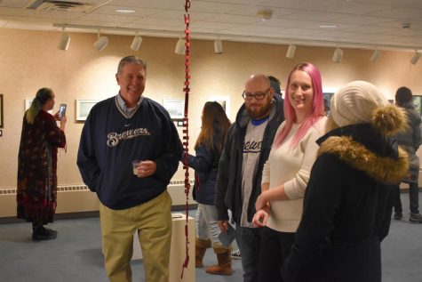 Mentors explain their work at Faculty Art Exhibit