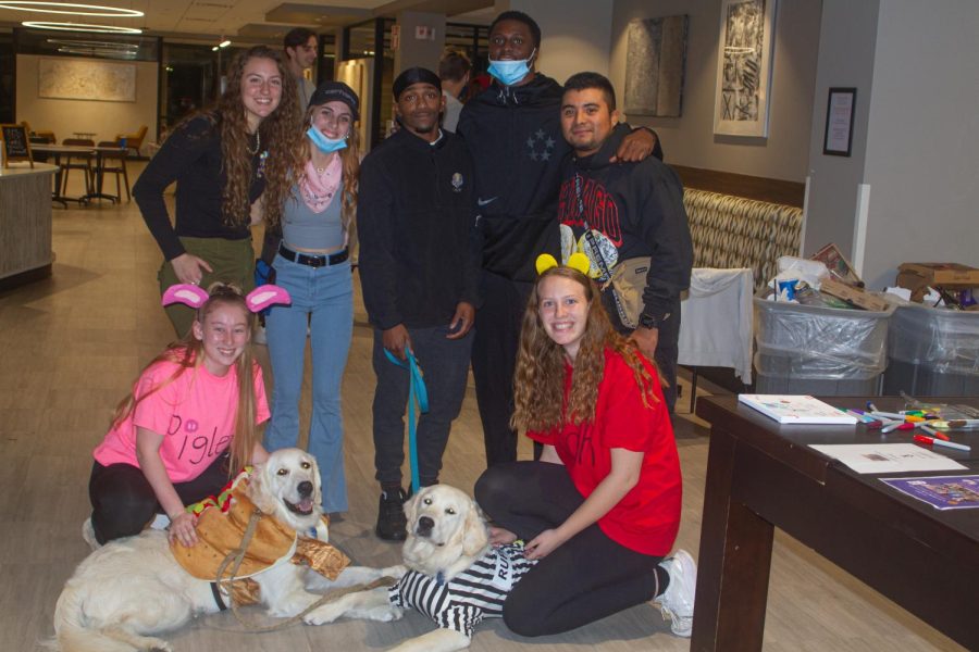 Pawsitism+trainers+and+supportive+Lakeland+students+attending+the+Boo-Bash+fundraiser.