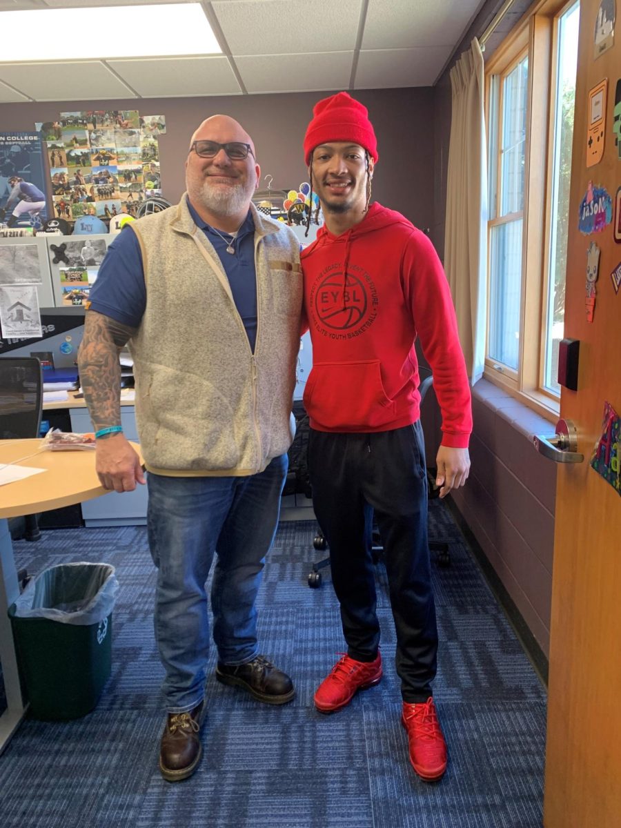 Jason Hraban, Lakeland's director for Campus Safety, and Markese Collins, one of Campus Safety's student workers, in Hraban's office. Photo credit: Campus Safety.