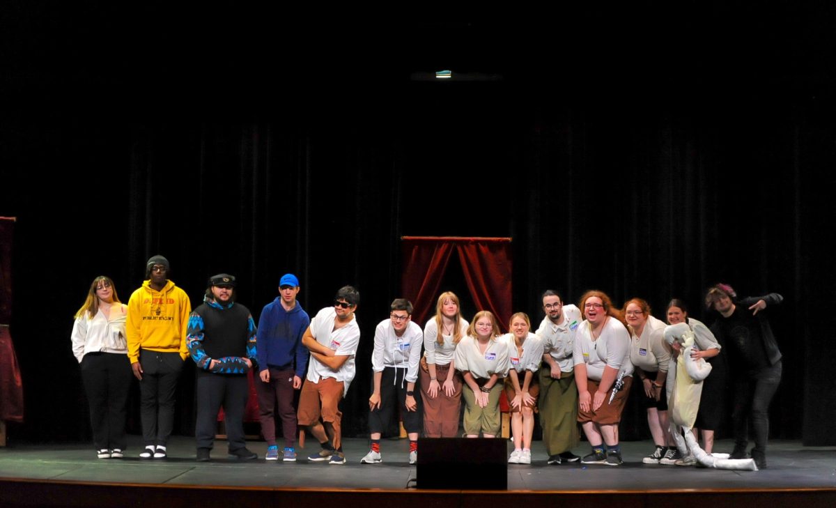 The cast of the fall 2025 play rehearse before the production.