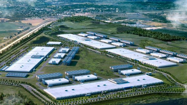 A generated image of the AI Data Center. A triangular formation of buildings covering farmland in the City of Port Washington. 