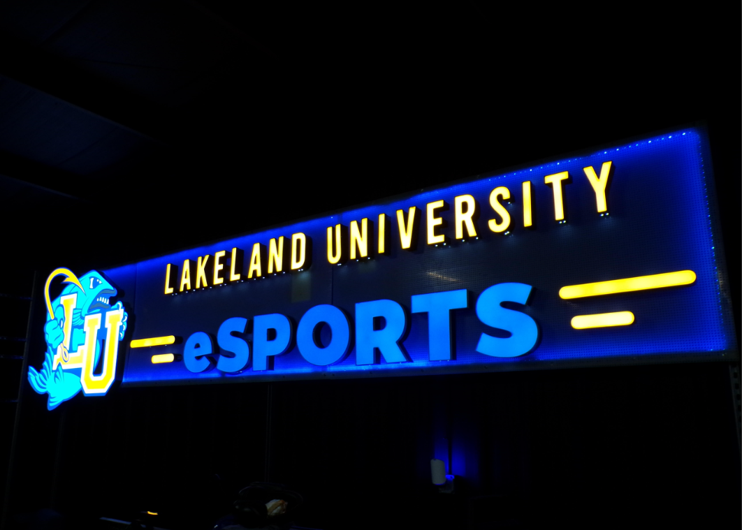 Lakeland University Esports LED sign lit up in a dark room, on March 24, 2026
