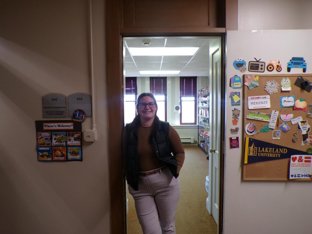 Mekenzy Hoisington in front of her office